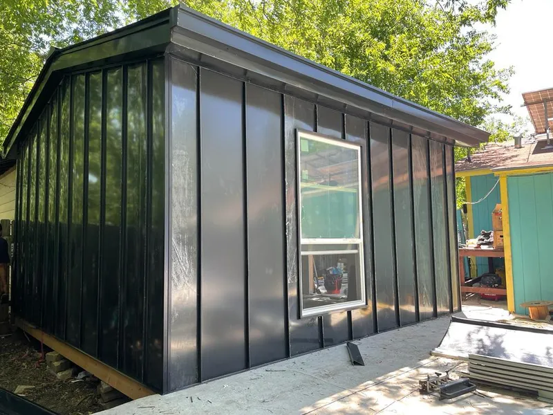 Black standing seam metal wall panels for Metal Roof Installation in Clarksburg